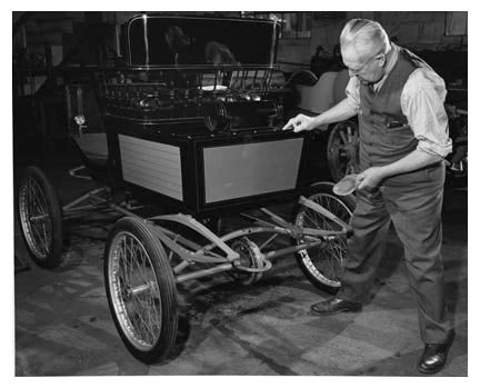 Harry Petersen (we believe) working on Bob Lyon's Lovomobile restored about 1950 by Richard Smith